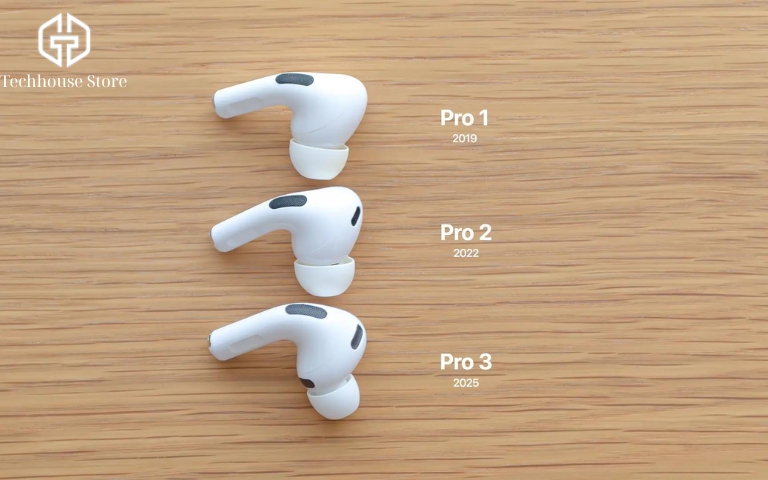 AirPods Pro có chống nước không? Mức chống nước từng đời và cách xử lý khi bị vô nước Ba đời AirPods Pro 1, Pro 2 và Pro 3 được đặt cạnh nhau trên bàn gỗ.